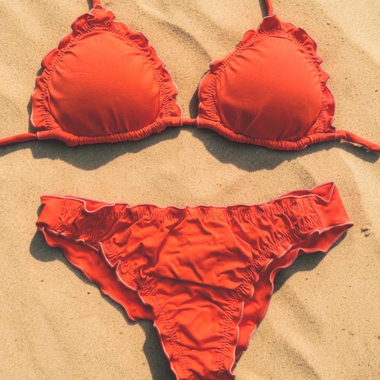 Conjunto de bikini Brasileño top triángulo + bottom culote push up naranjo Kai maia